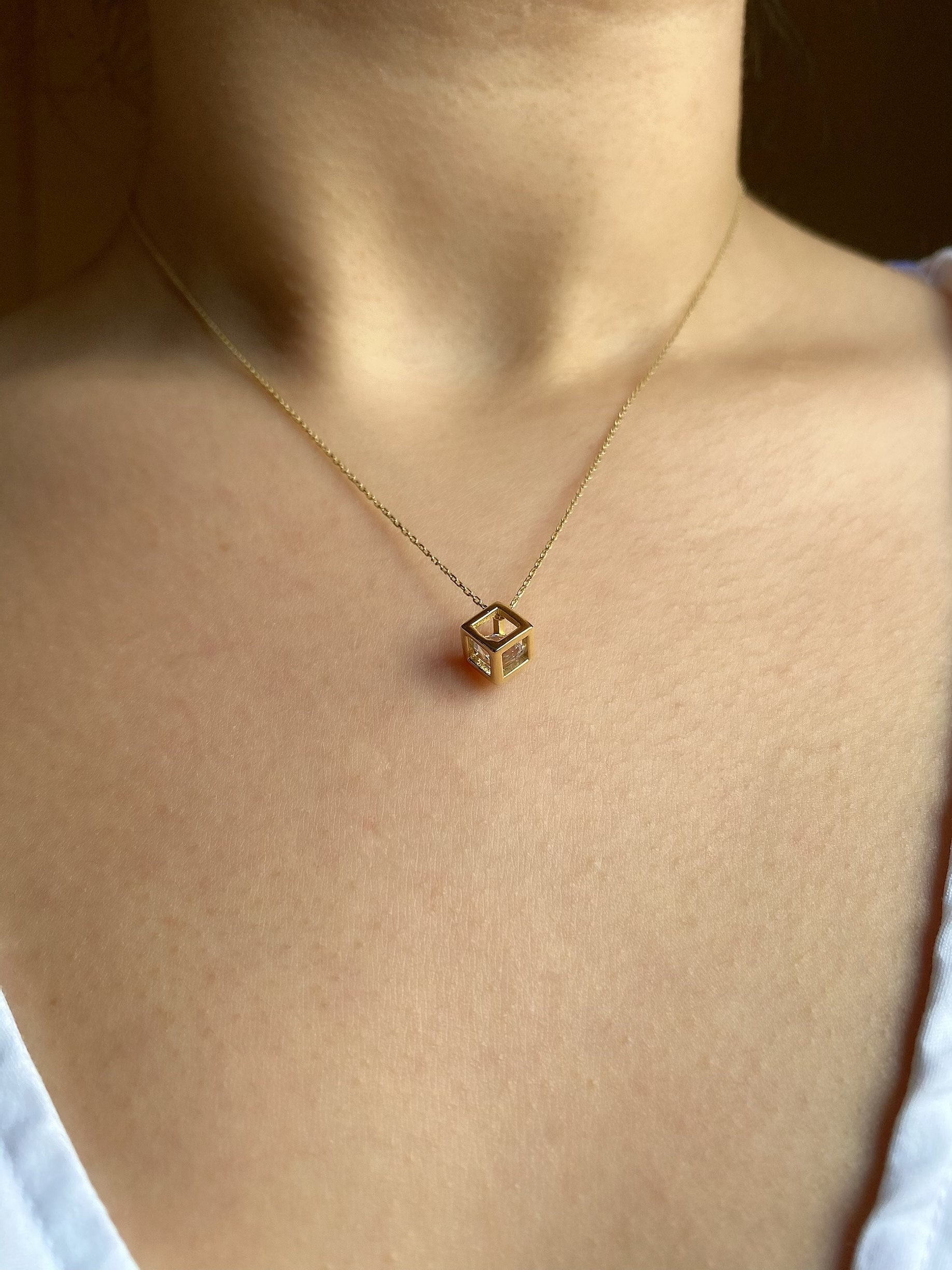 14k Solid Gold Cube Necklace: Moving Zirconia Diamond