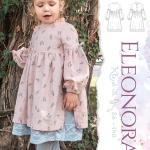 Op de afbeelding: Een roze jurk met een bloemenprint en een witte kantversiering. De jurk heeft lange mouwen met een geplooide detail aan de pols. De jurk is voor meisjes in de maten 86-140 cm. De tekst "ELEONORA Kleid in Gr. 86-140 Malina" staat aan de rechterkant van de afbeelding.