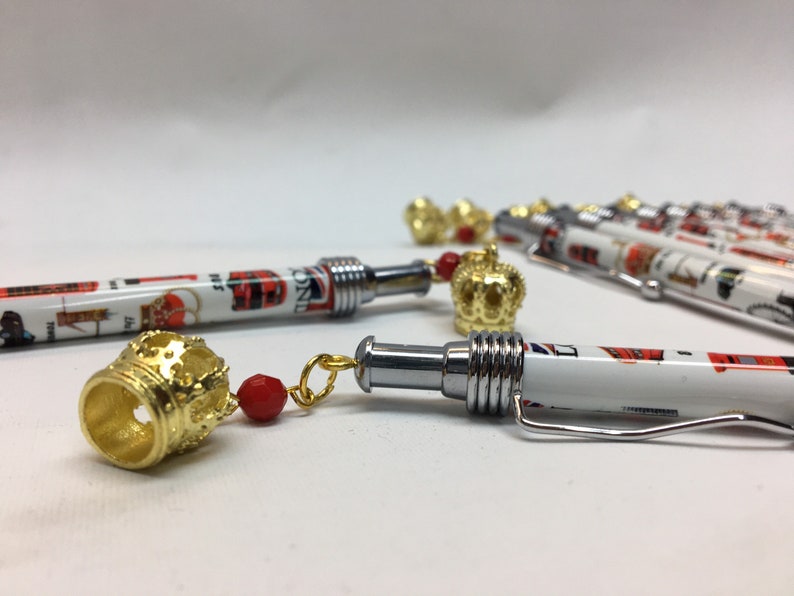 10 pens London Souvenir blue ink with golden crown top metal clip