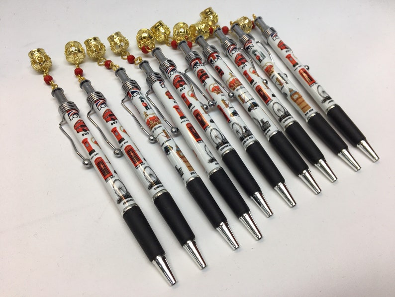 10 pens London Souvenir blue ink with golden crown top metal clip