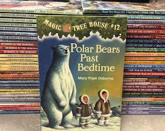 May include: A stack of Magic Tree House books with the cover of "Polar Bears Past Bedtime" featuring a polar bear and two children in winter clothing. The book is titled "Magic Tree House #12" and the author is Mary Pope Osborne.