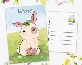 cute beige bunny postcard, "be hoppy" card, kawaii manga anime, bunny on a meadow, happy easter, pen pal