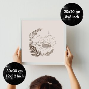 May include: A framed print with a minimalist landscape design in brown ink on a pale pink background. The artwork shows mountains, a lake, and foliage. The frame is white, and the print is available in 20x20 cm and 30x30 cm sizes.