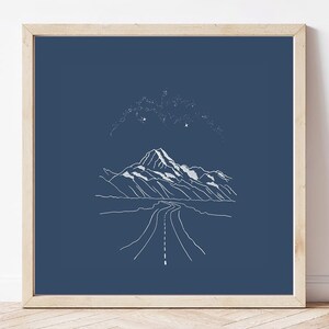 May include: A minimalist line art print of a mountain range with a winding road leading to the peak. The sky is a dark blue with white stars. The print is perfect for a modern home decor aesthetic.