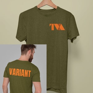 May include: A green t-shirt with an orange geometric logo on the front and the word "VARIANT" in orange on the back.