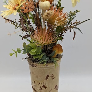 Autumn arrangement autumn decoration mushroom hedgehog daisy grasses yellow orange