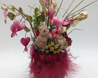 Easter arrangement feather bleeding heart rabbit pink