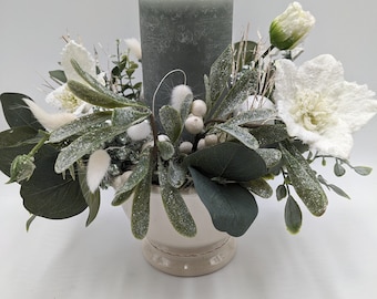 Winter arrangement candle Christmas rose mistletoe white