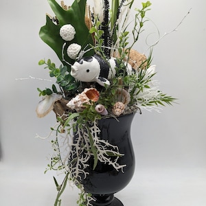 Summer arrangement maritime snail fish black