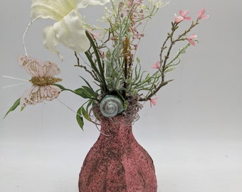 Summer arrangement snail butterfly lily pink