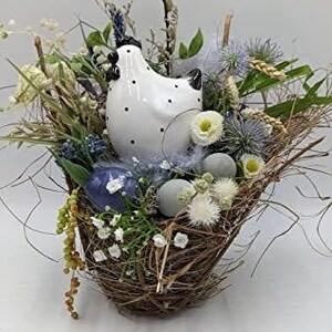 Easter arrangement spring arrangement egg feather chicken bellis checkered lily berries grasses blue black white