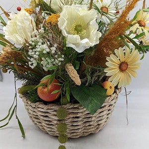 Autumn arrangement autumn decoration apple daisy grasses yellow orange