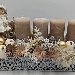 Christmas arrangement Advent arrangement table arrangement ball cone star candle girl fur berries grasses taupe gold cream