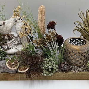 Autumn arrangement autumn decoration tealight lemon bird cones berries grasses cream gold