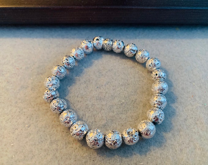 Silver colored metallized lava bead stretch bracelet