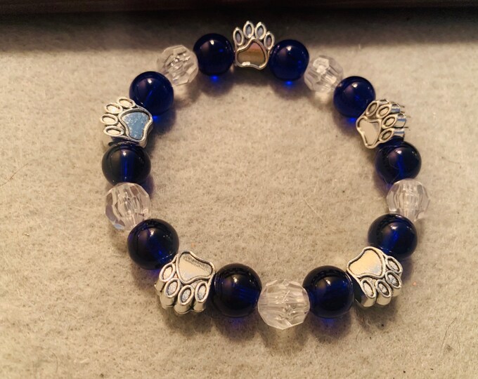 Bulldog paw Royal Blue Sparkly beaded stretch bracelet with off setting blue and clear beads