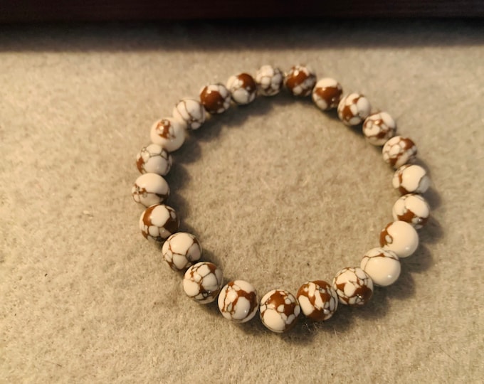 Brown and white beaded bracelet