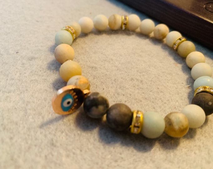 Evil eye beaded bracelet with evil eye charm