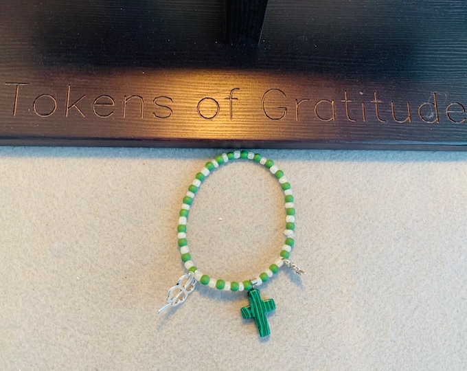 St Patrick’s Day Beaded Stretch Bracelet with green cross charm and clover charms