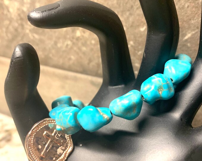 Turquoise Beaded Stretch bracelet with copper color cross charm