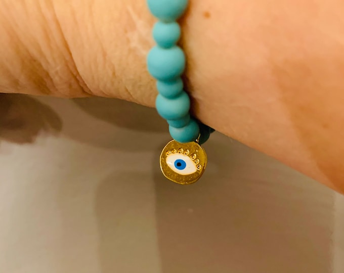 Evil eye beaded bracelet with 3 evil eye charms