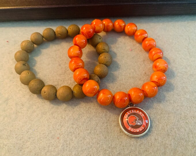 Brown and Orange CLE themed beaded stretch bracelet set (2) with Cle helmet charm