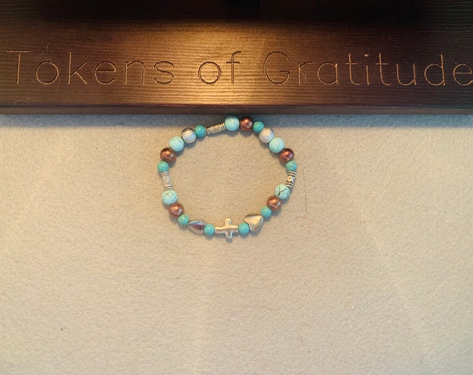 Turquoise color cross beaded bracelet