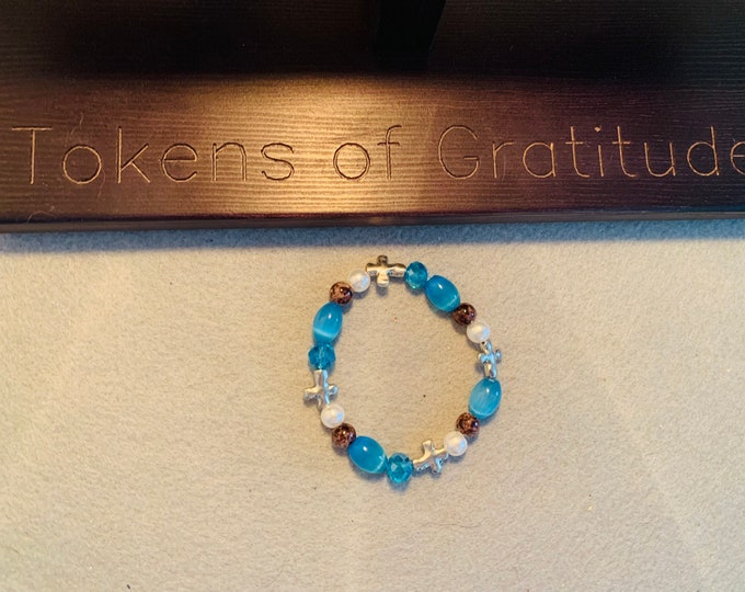 Turquoise color cross beaded bracelet