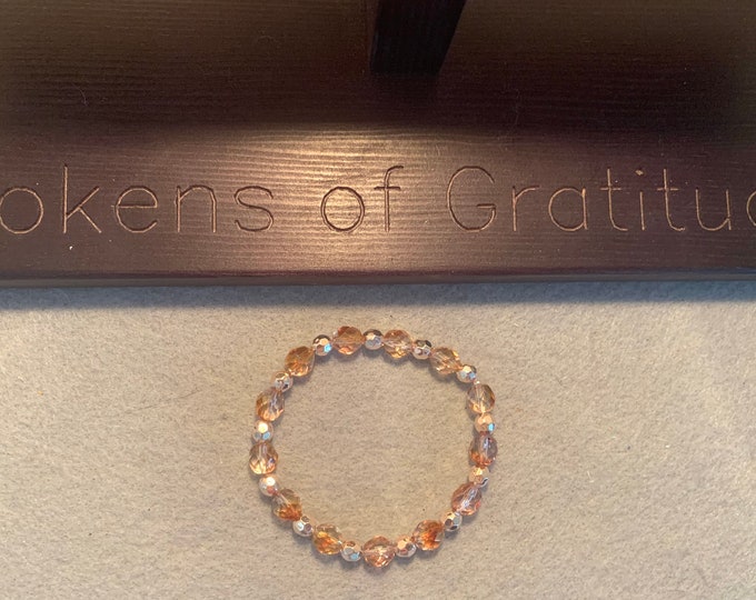 Rose Gold & Beige colored beaded stretch bracelet