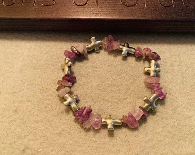 Purple stone stretch bracelet with silver metal crosses