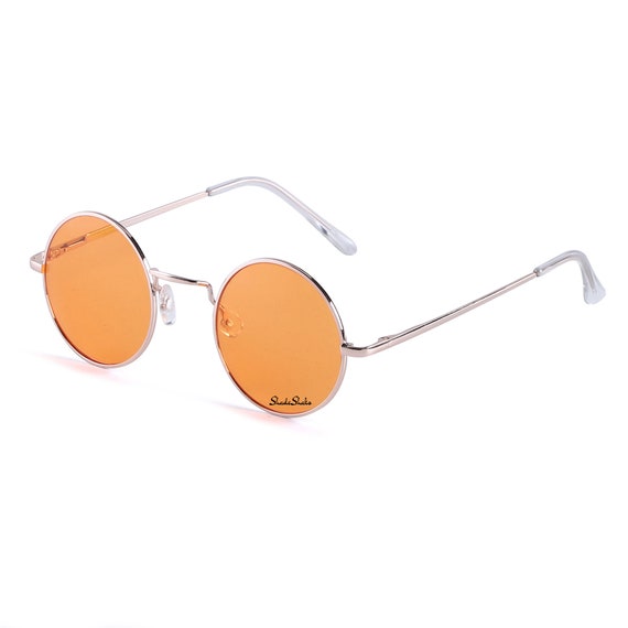 John Lennon's sunglasses sell for £137,500 - Radio X