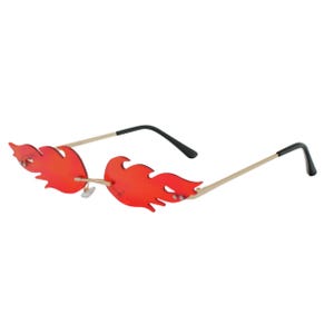 May include: Red flame-shaped sunglasses with gold-colored frames and black temples. The lenses are a vibrant red, and the frames have a sleek, modern design. These sunglasses are a unique fashion accessory.