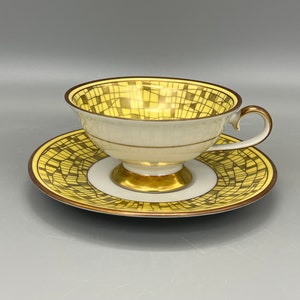 Porcelain thea cup and saucer , beautiful yellow and gold decor . German Bavaria porcelain.
