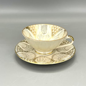 Porcelain mocca cup and saucer , beautiful white  and gold decor . German Bavaria porcelain.