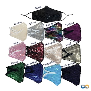 Puede incluir: Una colección de 14 mascarillas faciales hechas de tela de lentejuelas en varios colores, incluyendo negro, crema, plata, arcoíris, fucsia, rosa, rojo, oro rosa, oro, verde, azul real, turquesa y morado oscuro.