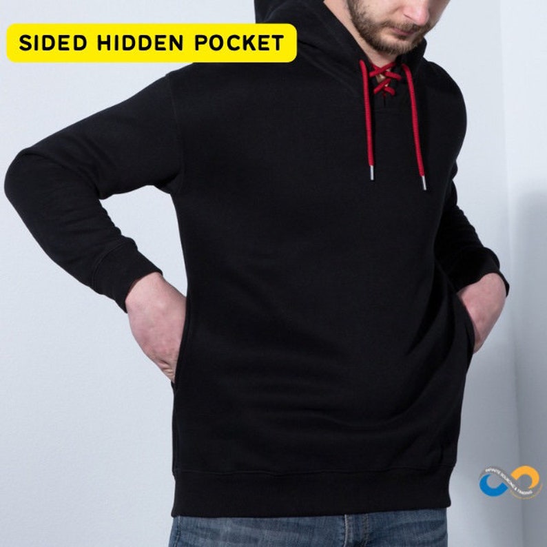 May include: Black hoodie with a drawstring neckline and a kangaroo pocket. The hoodie has a red lace-up detail at the neckline and the text "SIDED HIDDEN POCKET" in a yellow box.