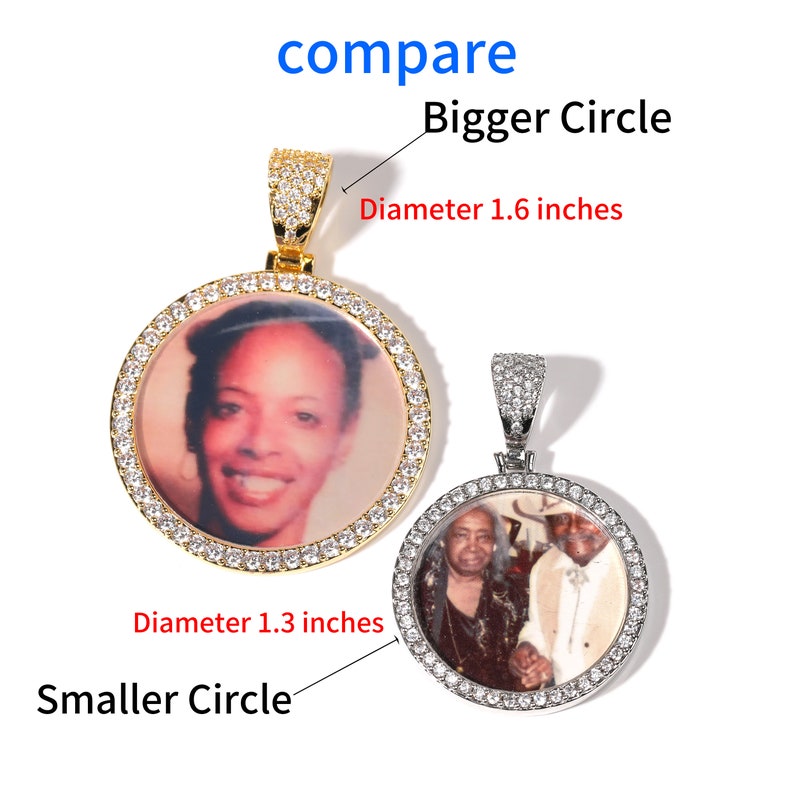 May include: Two gold and silver photo pendants with clear cubic zirconia stones. The larger pendant is 1.6 inches in diameter and the smaller pendant is 1.3 inches in diameter.