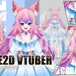 May include: A digital illustration of a pink and purple haired anime character with fox ears and a white tail. The character is wearing a blue and white dress with a white bow. The text "LIVE2D VTUBER" and "Free 2 expressions" is at the bottom of the image.
