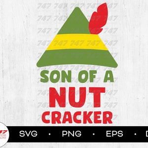 May include: A green and yellow elf hat with a red feather on top. The text "Son of a Nut Cracker" is written in red below the hat.