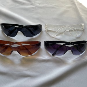 Trendy Wrap Around Sunglasses, Colours available: purple, black, clear, brown