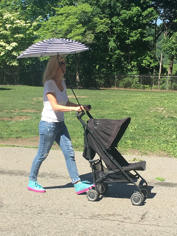 The MUMBRELLA™ Stroller Umbrella With 