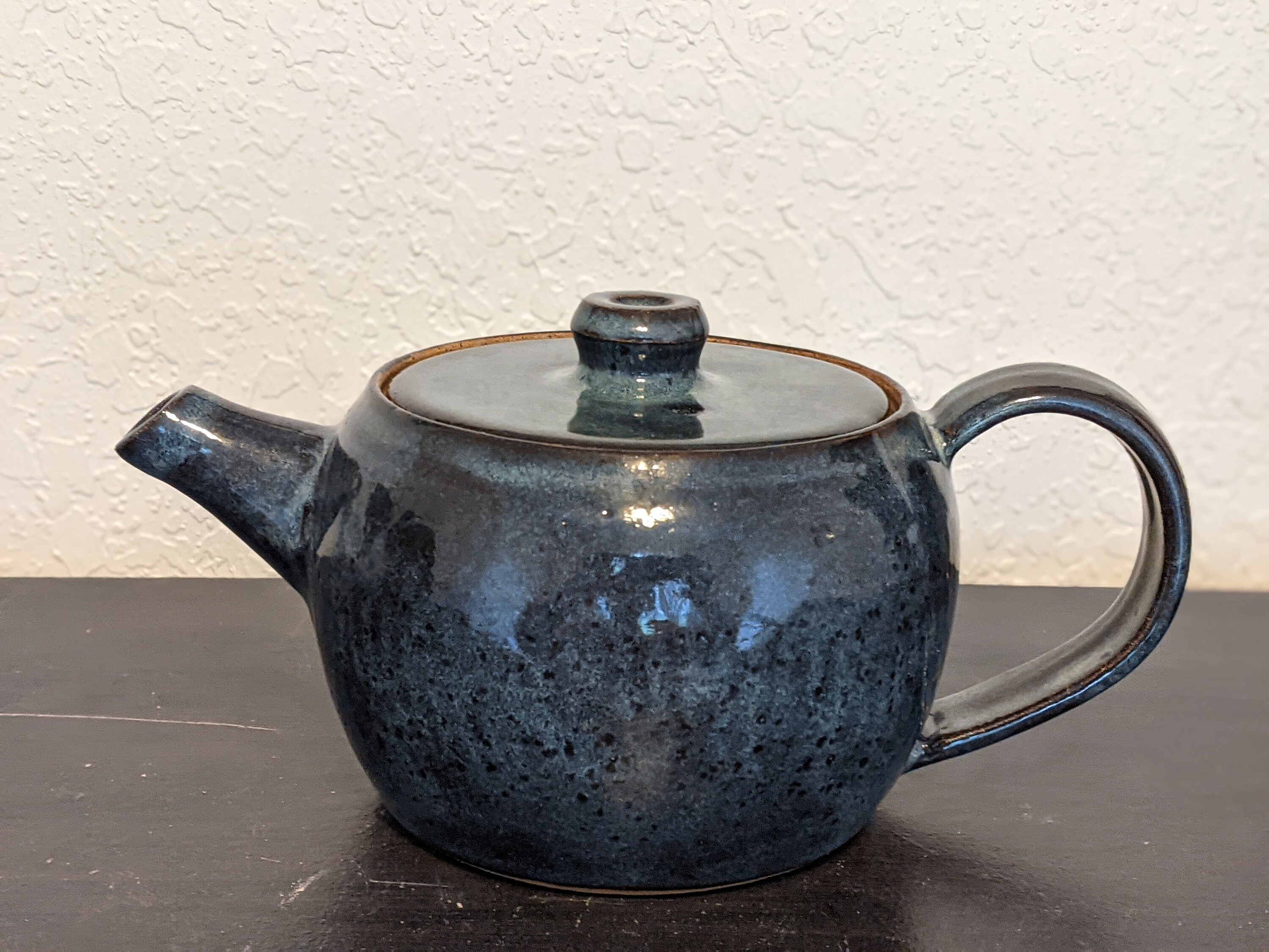 blue ceramic teapot