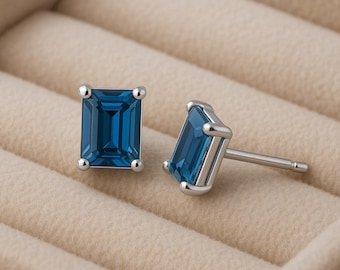 Emerald Cut London Topaz Stud Earrings: Sterling Silver December Birthstone