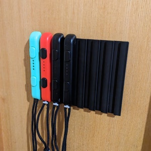 Uchwyty ścienne JoyCon na 2, 4, 6 lub 8 pasków do pilota