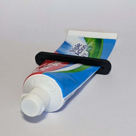 Toothpaste pusher discount