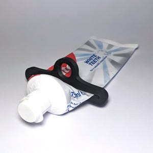 Toothpaste Squeezer Hanging Hole