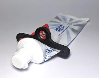 Toothpaste Squeezer Hanging Hole