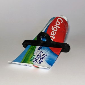 Zahnpasta Squeezer Hängeloch