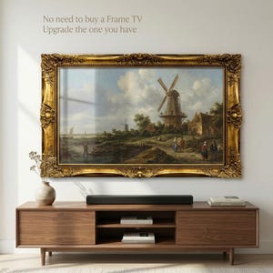 May include: A television screen displaying a landscape painting of a windmill in a field, enclosed in an ornate, heavy gold-coloured frame. Above the screen, the text reads: No need to buy a Frame TV. Upgrade the one you have. A soundbar sits below.