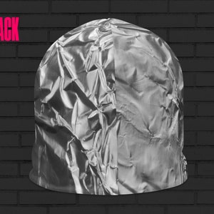 May include: A silver beanie hat with a crinkled texture. The hat is made of a shiny, metallic material.